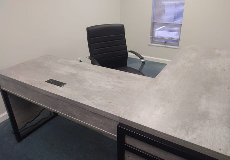 L-shaped desk with task chair at the Jewish Community Center of Columbus, Ohio