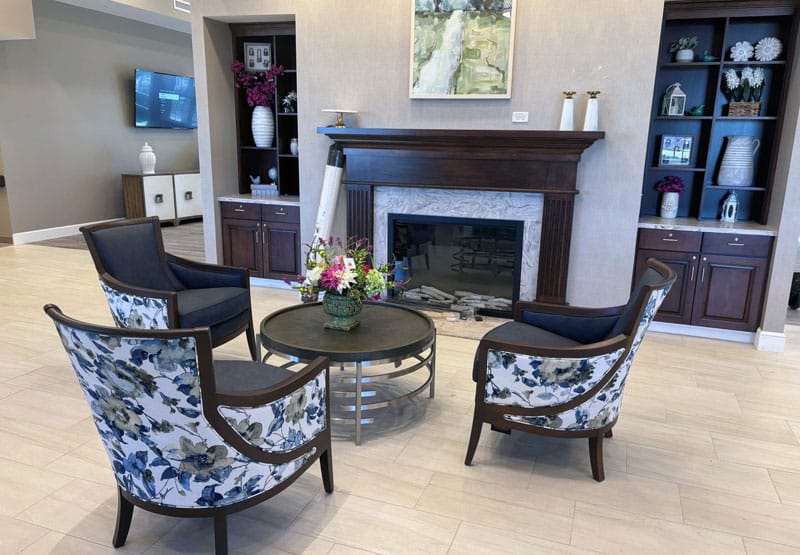 Common area lounge with guest chairs and coffee table at Foundations Health in Marion, Ohio
