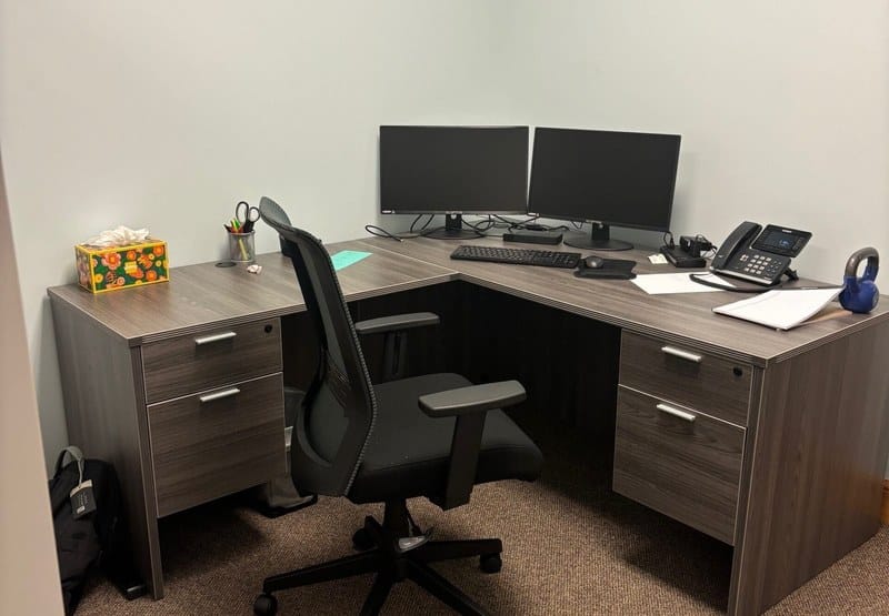 L-shaped desk with task chair at Emerson Thomson Bennet in Akron, Ohio