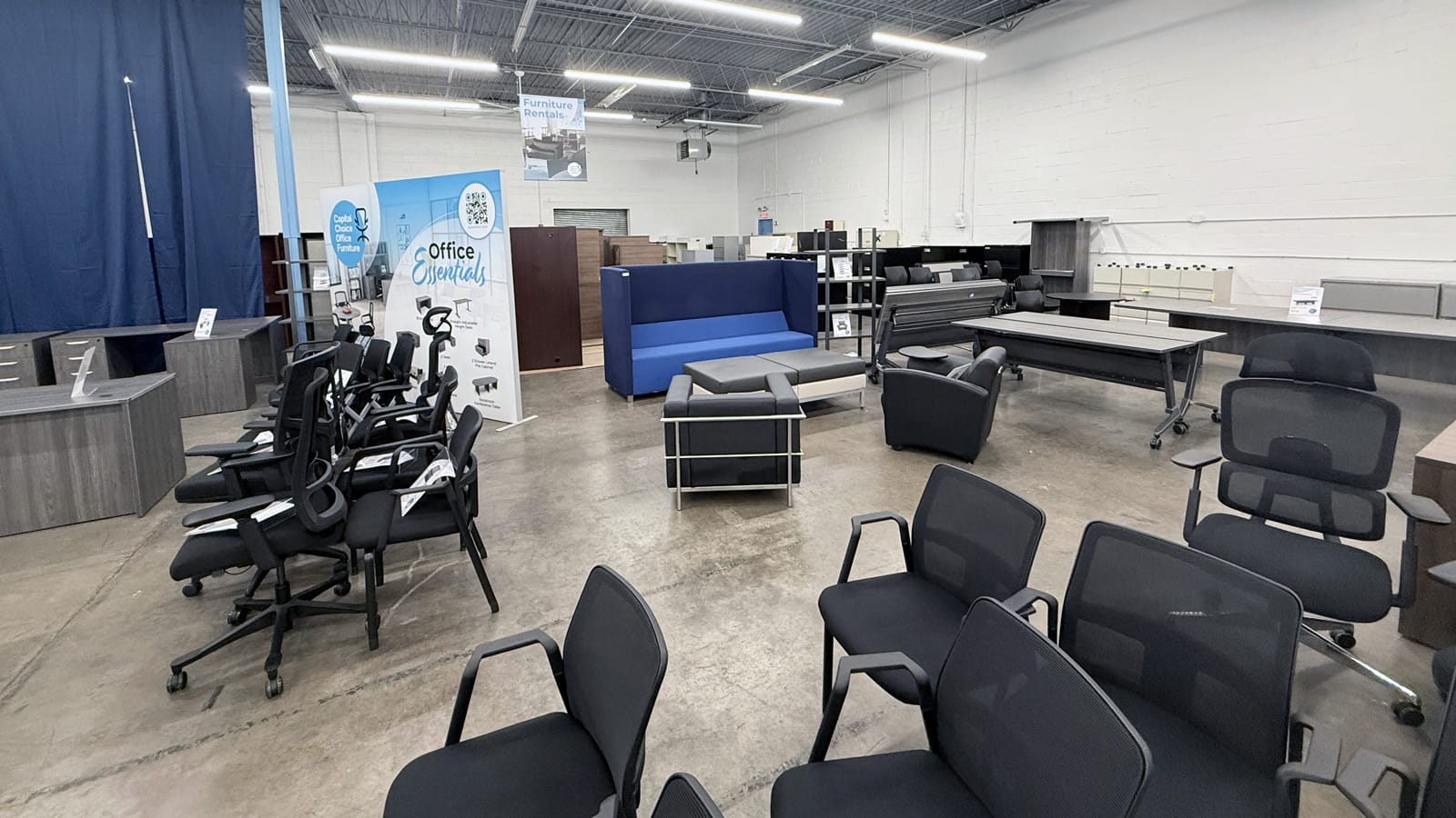 Used office chairs and desks in the Capital Choice warehouse