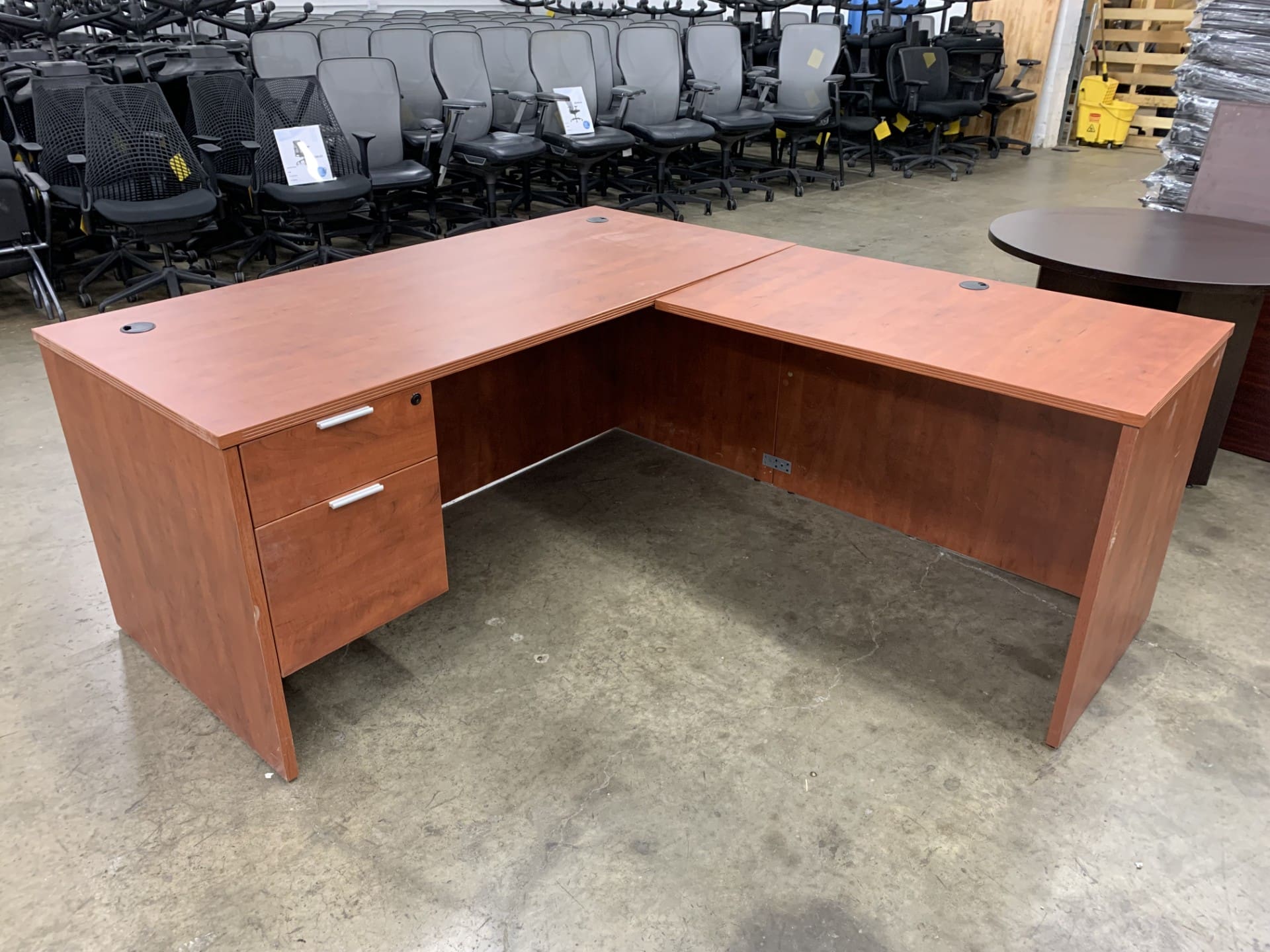 Pre-Owned L Desk – 66″X30″ Desk with 42″X24″ Return and Hanging B/F Image