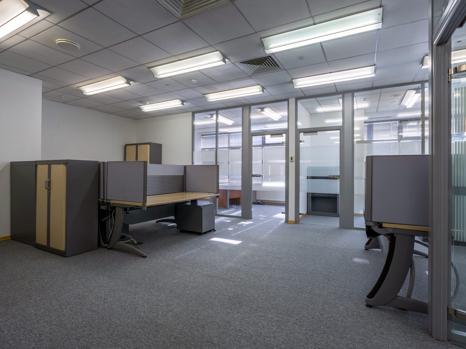 An empty cubicle farm at a brand-new office.