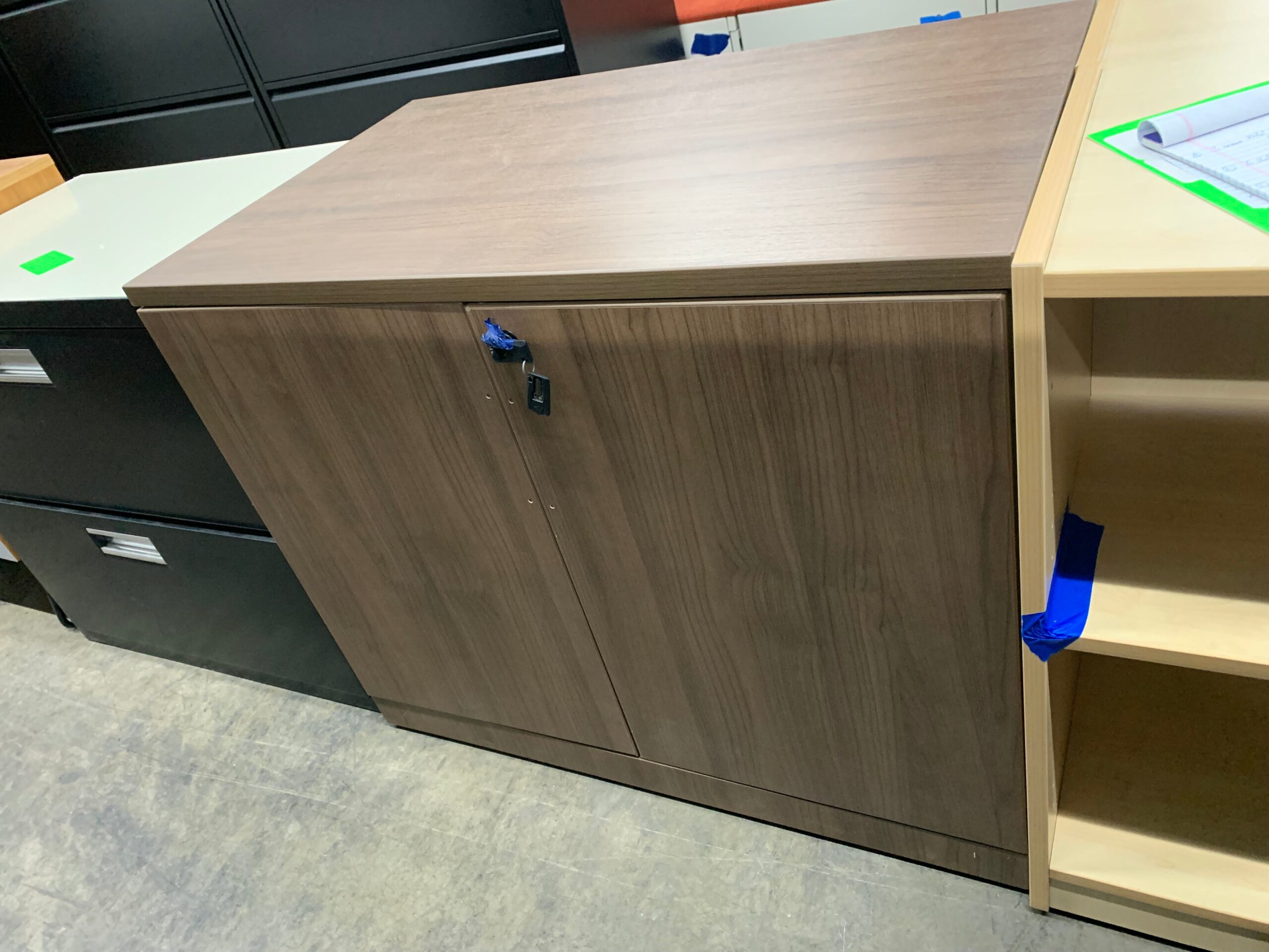 Pre-Owned 2 shelf walnut storage cabinet with doors Image